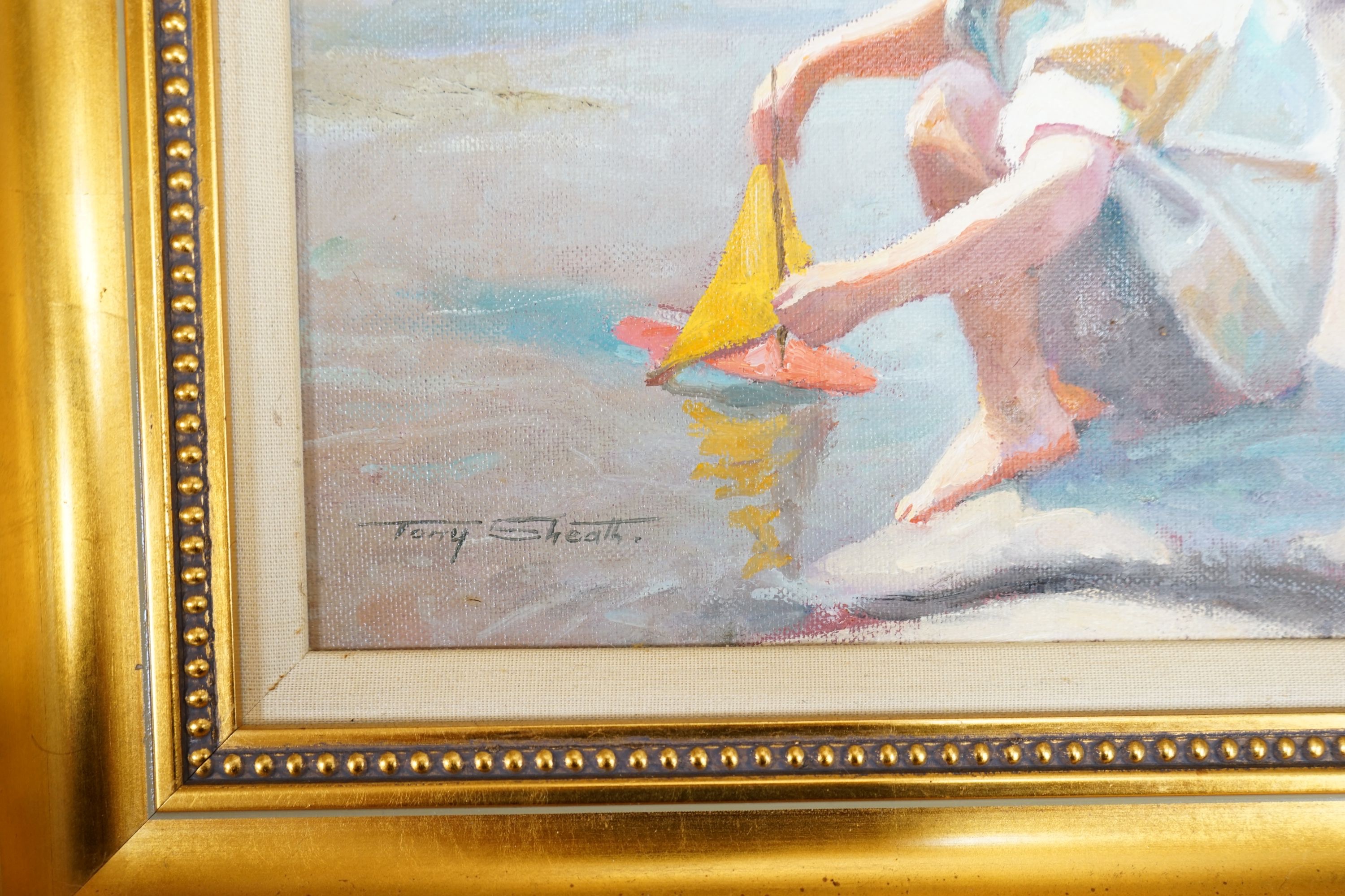 Tony Sheath (b.1946), oil on board, Boy with a toy sailing boat, signed, 20 x 25cm